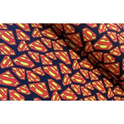French Terry Sommersweat Superhelden Stoff S-Logo Rot Gelb Schwarz - 180 cm Überbreite – 240g/m²