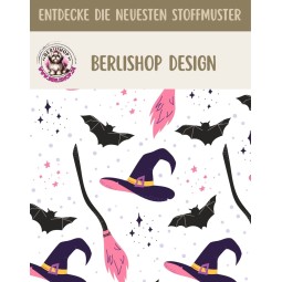 Baumwollstoff mit Hexenhüten und schwarzen Fledermäusen auf weißem Hintergrund mit lila-pinken Akzenten.